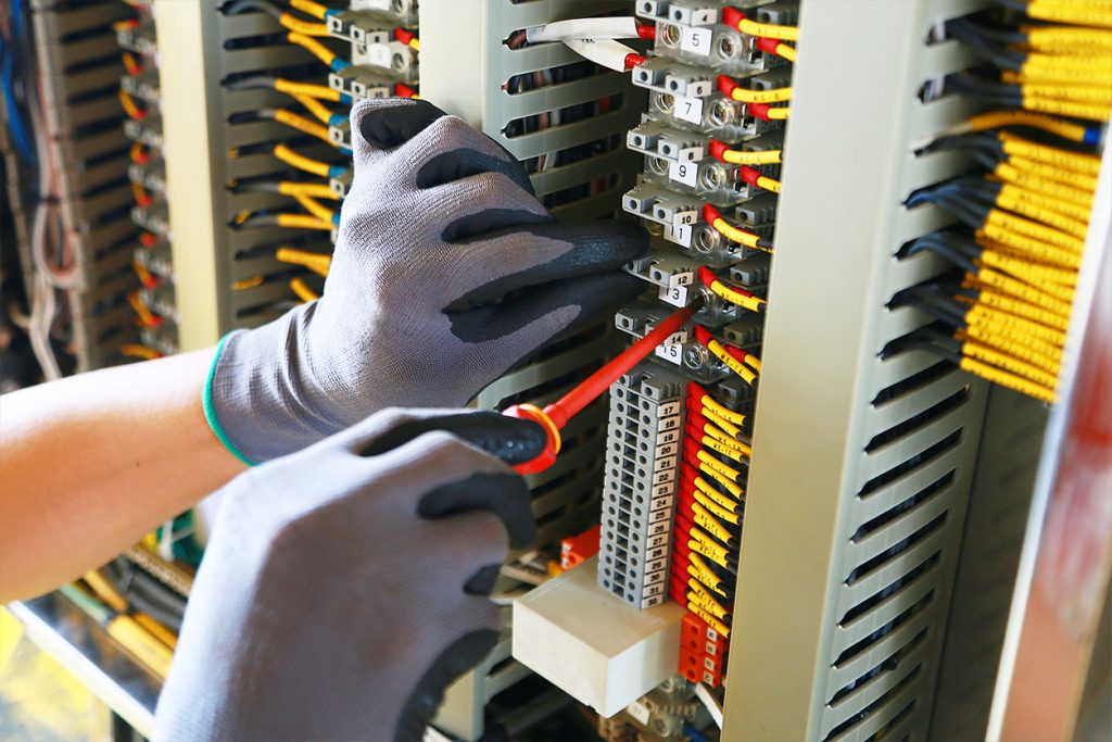 Electrician working with wires